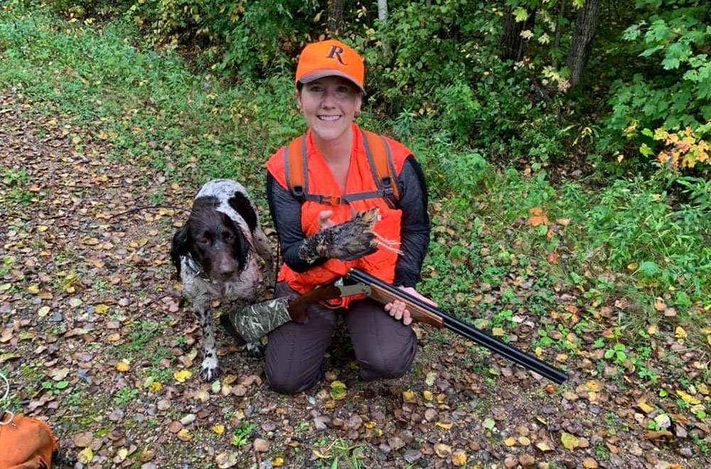 Woman and Dog Hunting