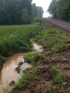Common unpermitted wetland fill site with no permit, no silt fencing and no monitoring