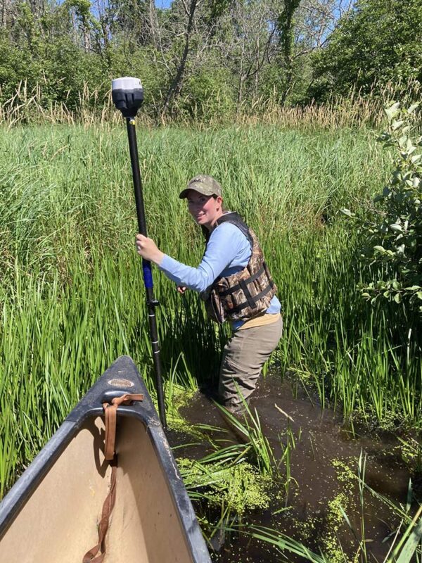 Anna Rzchowski surveying Poygan Marsh