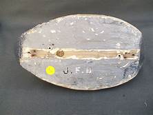 The bottom of a Ducharme Decoy carved with his JFD initials