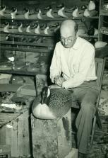 Lem Ward painting a decoy